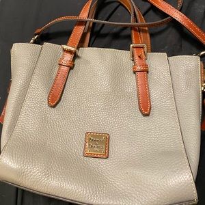 Dooney & Bourke hand bag with cross body strap